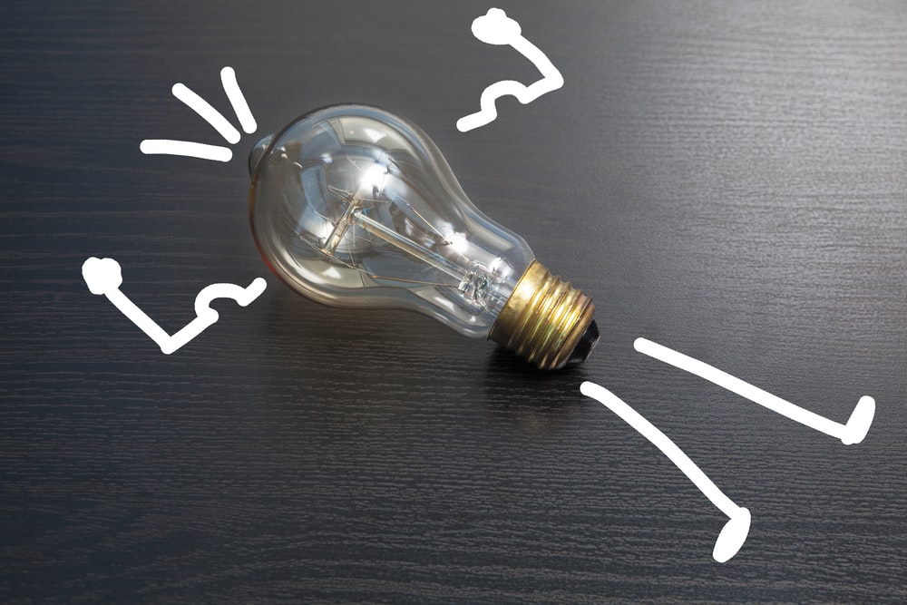 light bulb on black surface